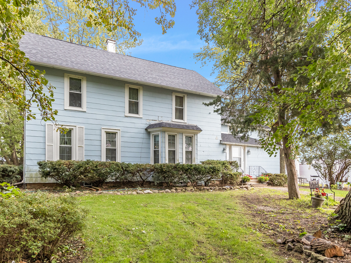 13561 West Kennedy Road Manhattan, IL 60442 - Photo 2 of 28 a front view of a house with garden
