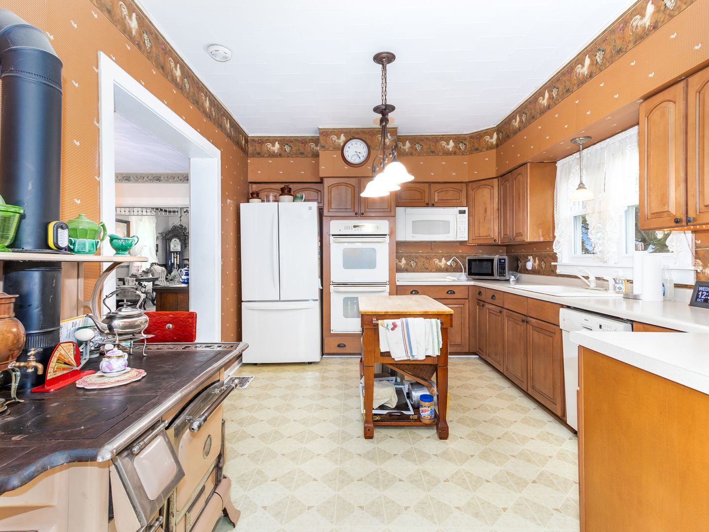 13561 West Kennedy Road Manhattan, IL 60442 - Photo 6 of 28 a large kitchen with lots of counter space and a sink