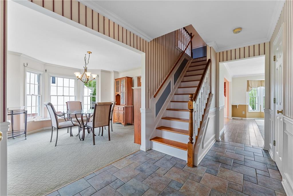 Foyer with view of dining room and into the living/kitchen area