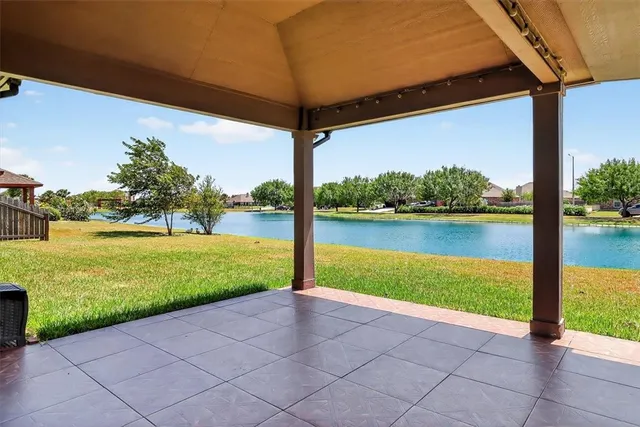 a view of a yard and ocean view