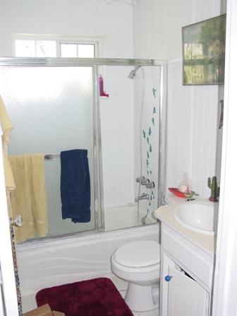 3805 Selvage Road Santa Rosa, CA 95401 - Photo 4 of 10 a bathroom with a sink toilet and shower