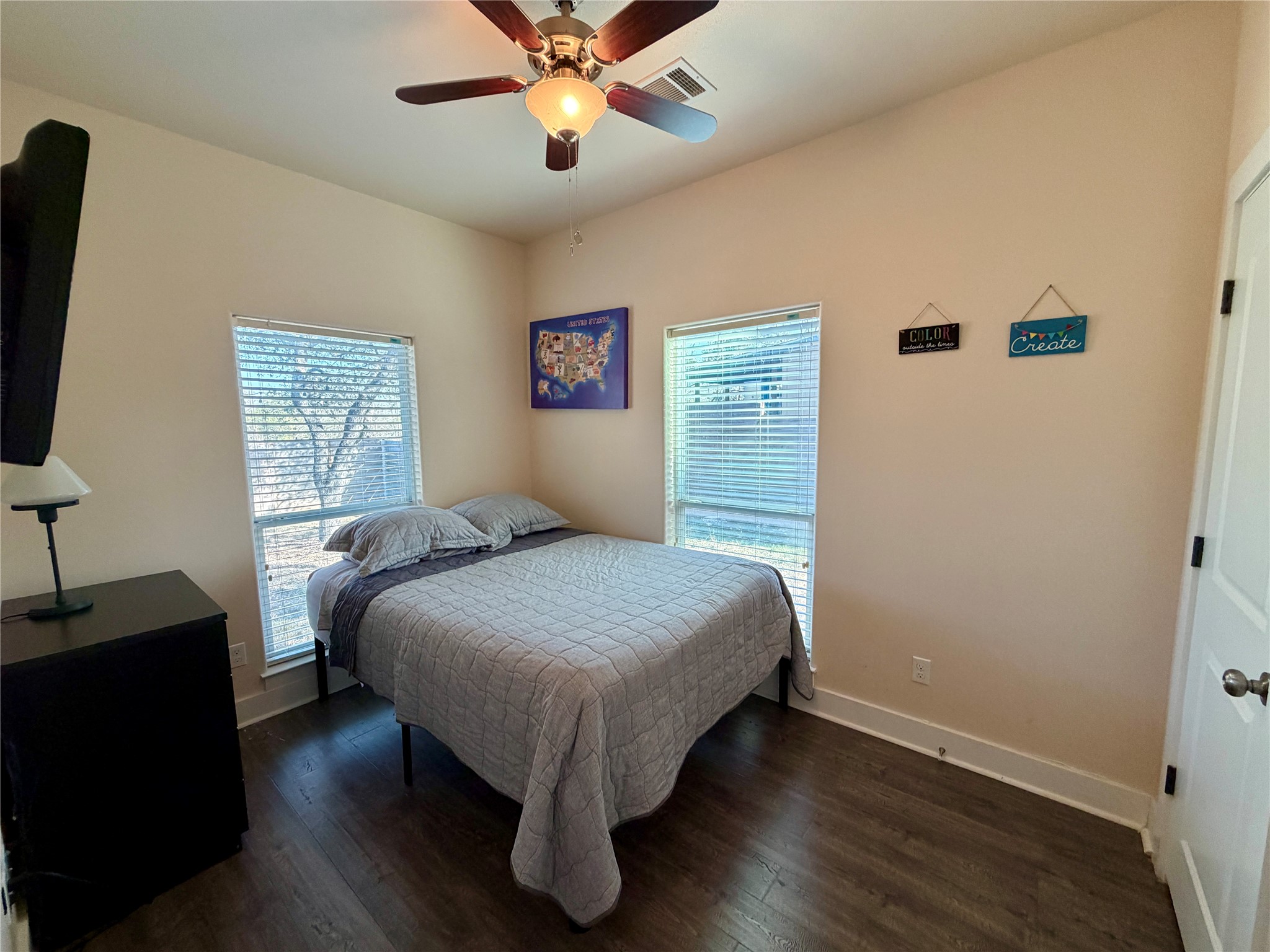 5503 Hiline Road Austin, TX 78734 - Photo 15 of 20 Bedroom featuring dark wood-style floors and ceiling fan