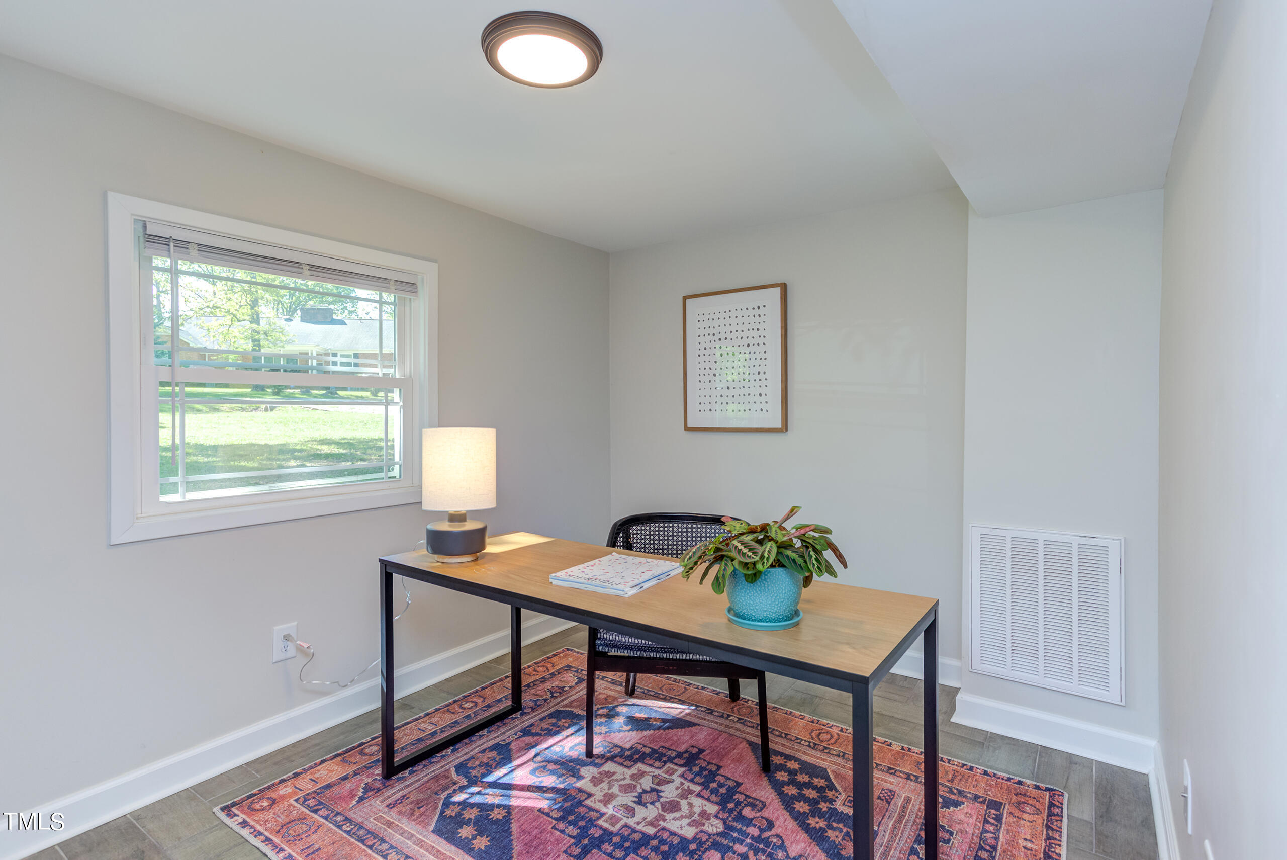 142 Chateau Road Durham, NC 27704 - Photo 32 of 45 a view of a workspace with furniture