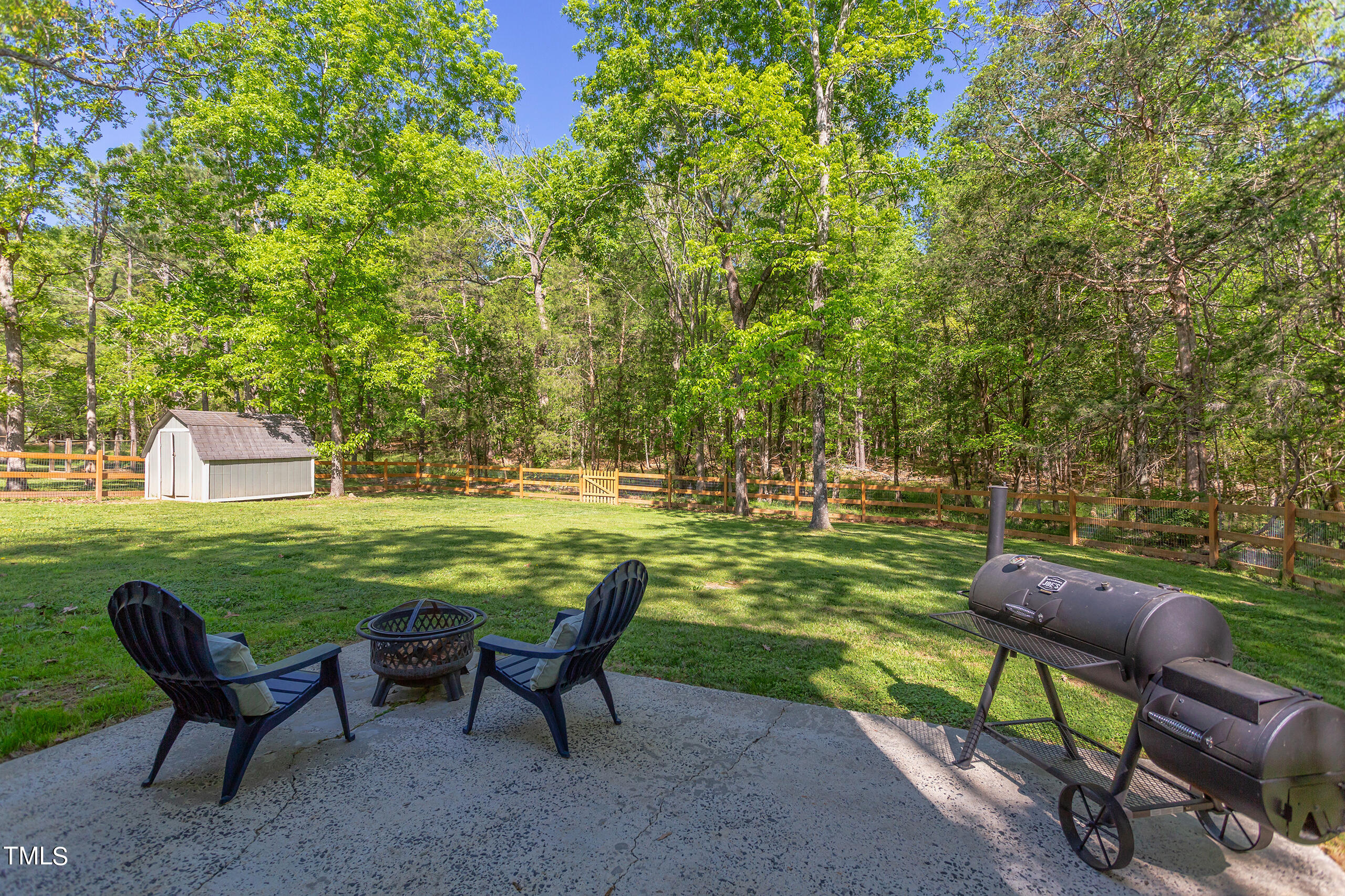 142 Chateau Road Durham, NC 27704 - Photo 40 of 45 a view of a garden with chairs
