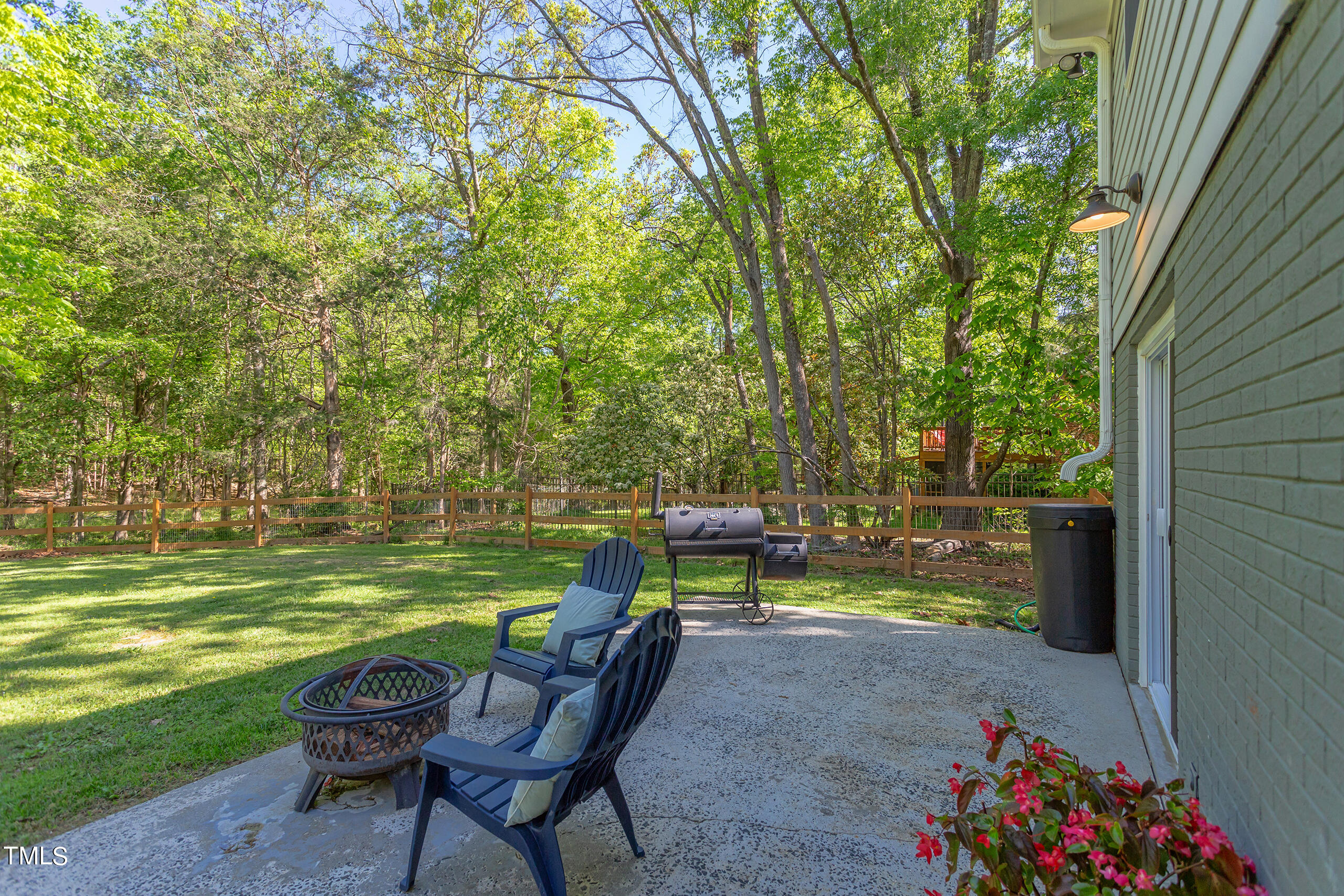 142 Chateau Road Durham, NC 27704 - Photo 41 of 45 a view of a two chairs in a backyard