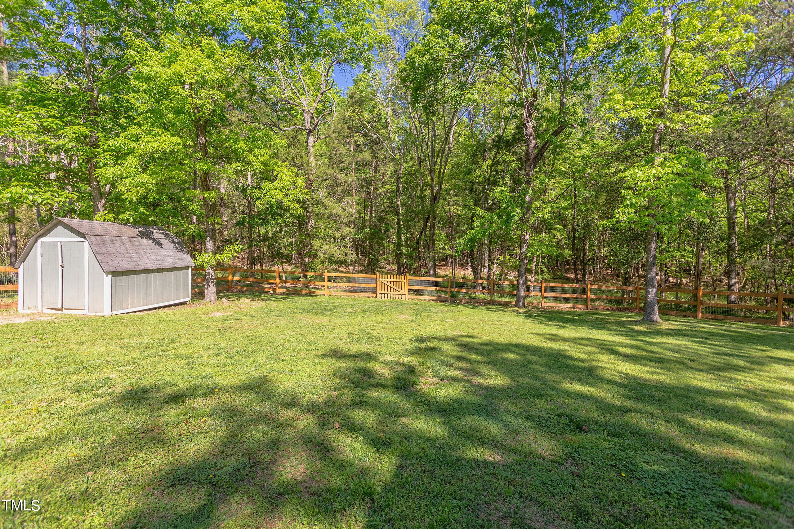 142 Chateau Road Durham, NC 27704 - Photo 44 of 45 a swimming pool with outdoor seating and yard