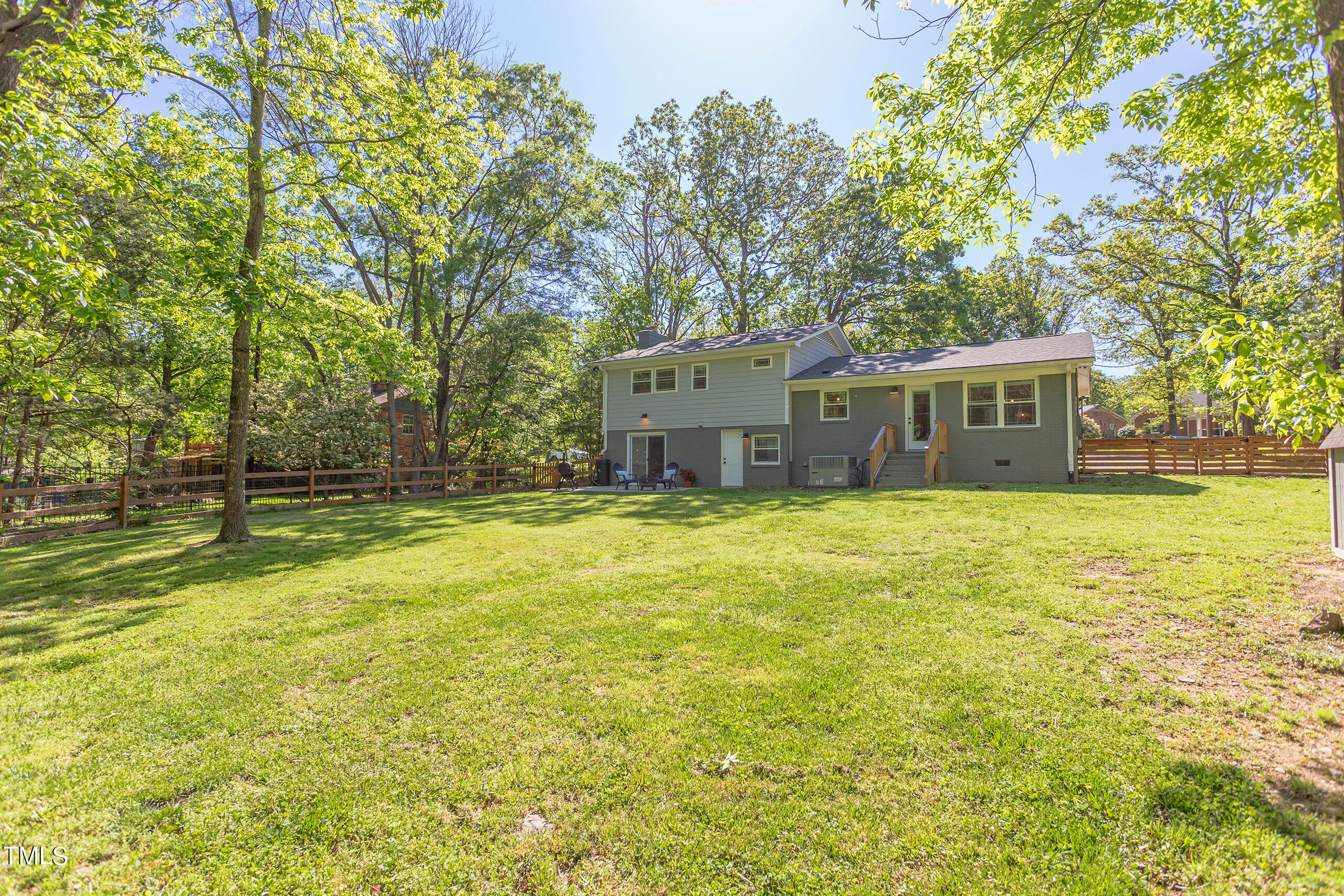 142 Chateau Road Durham, NC 27704 - Photo 45 of 45 a house view with swimming pool in front of it