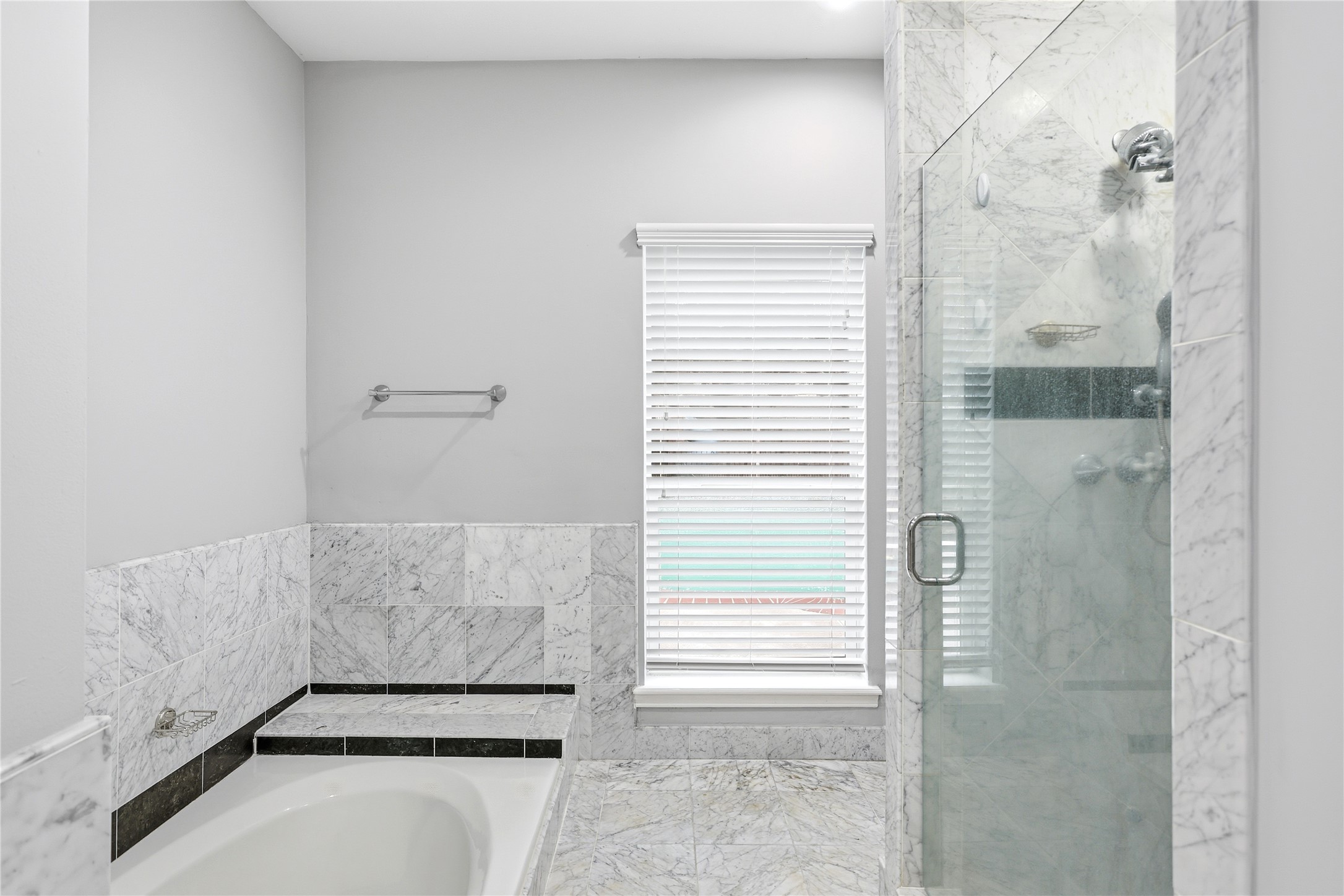 11507 Del Monte Drive Houston, TX 77077 - Photo 25 of 44 Primary bathroom with double sinks, tub and shower.