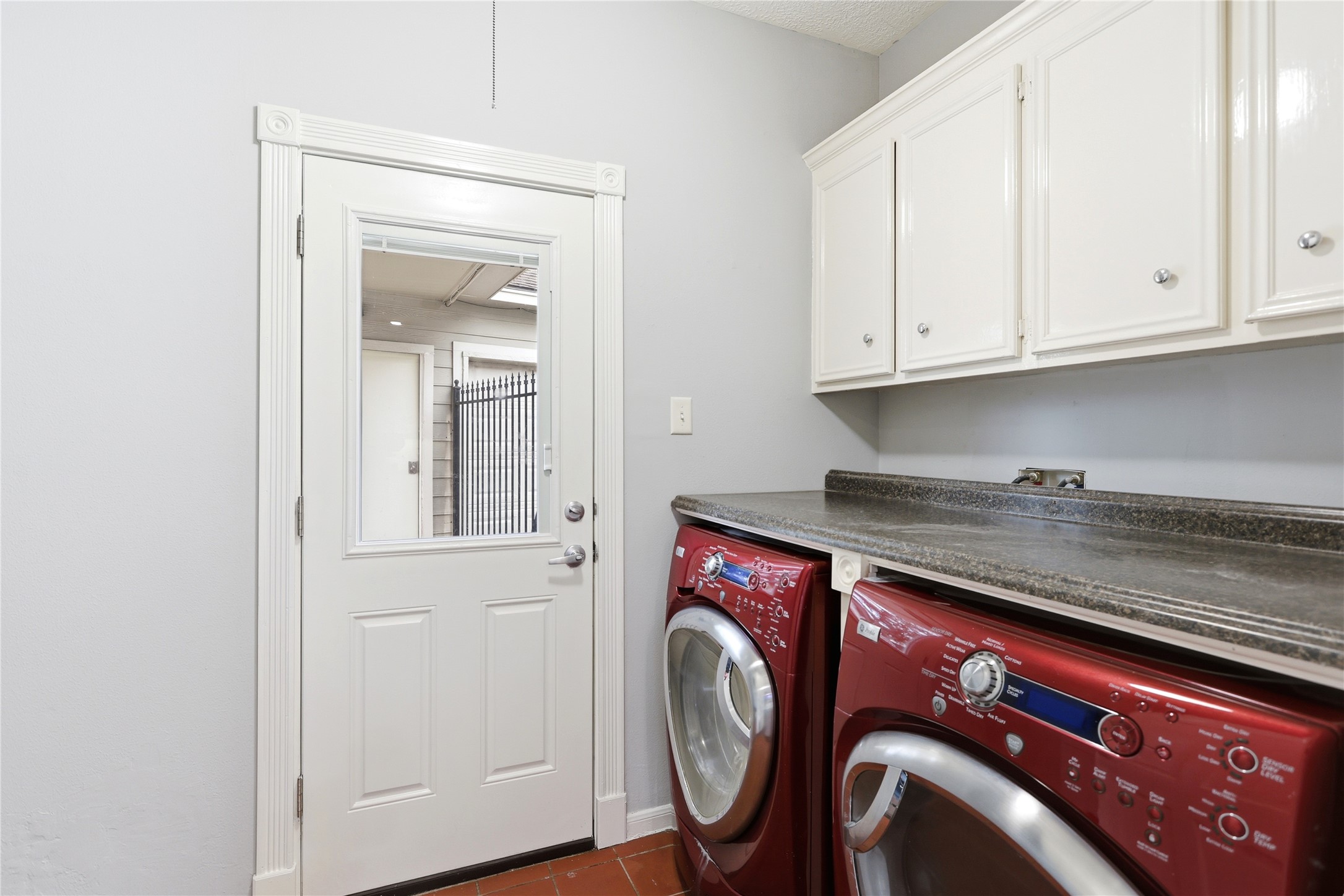 11507 Del Monte Drive Houston, TX 77077 - Photo 39 of 44 Utility room includes washer and dryer.