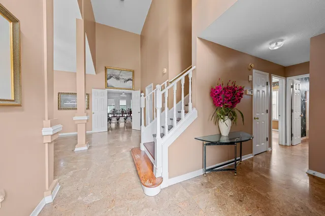 a view of entryway livingroom and hall