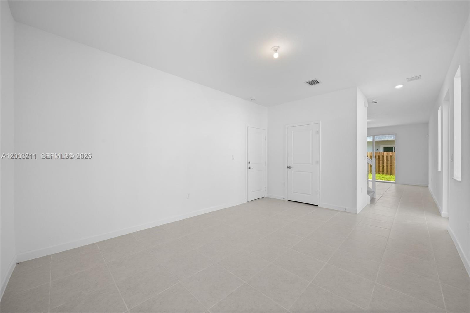 715 Southeast 15th Street Homestead, FL 33034 - Photo 6 of 38 a view of an empty room