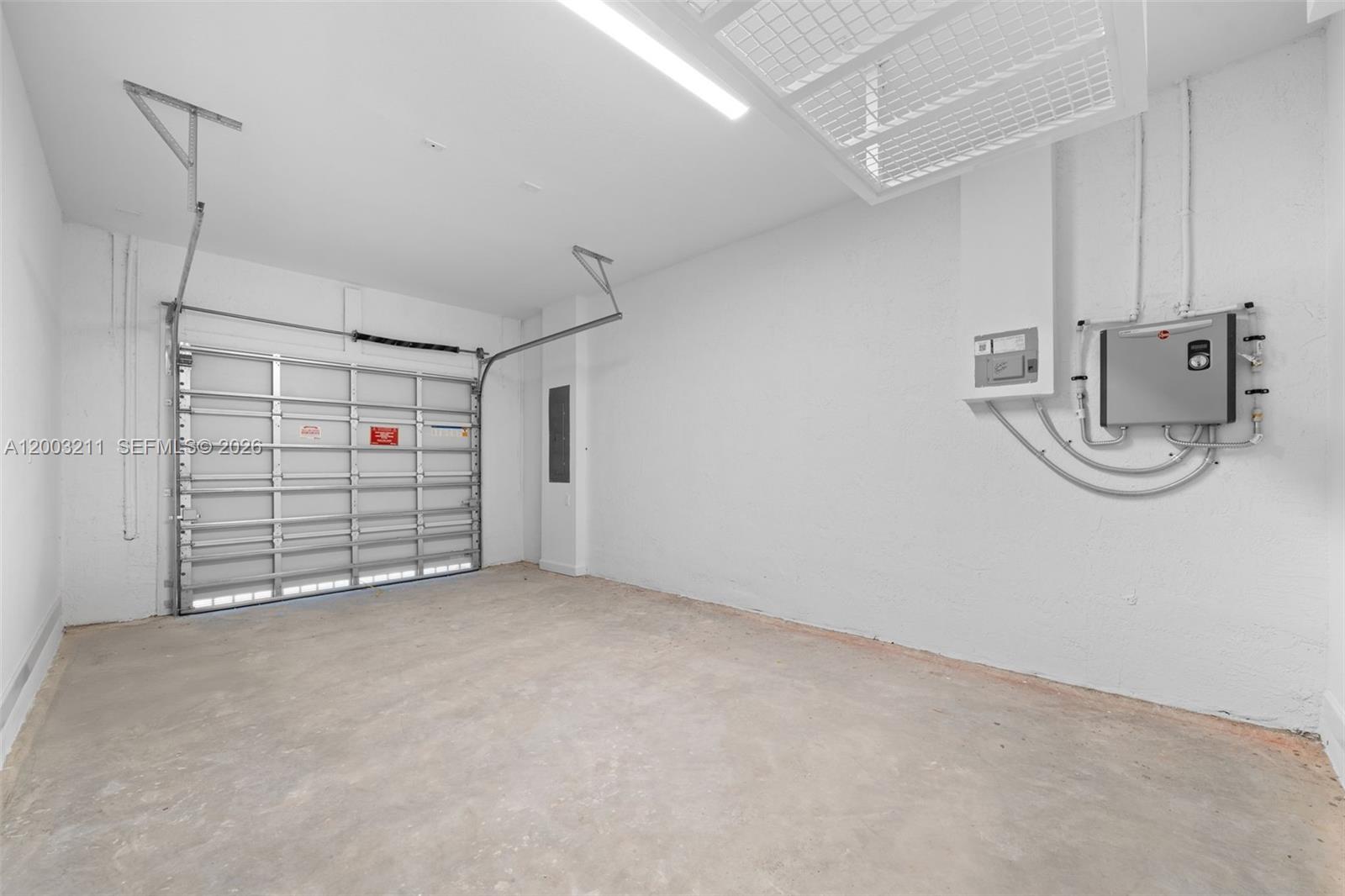 715 Southeast 15th Street Homestead, FL 33034 - Photo 8 of 38 a view of a garage room