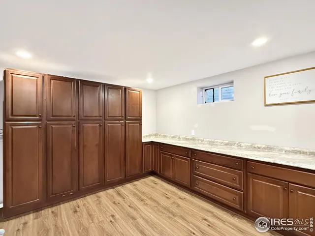 a view of kitchen with wooden floor