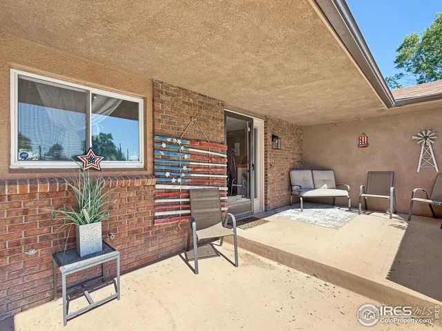 a building outdoor space with patio furniture