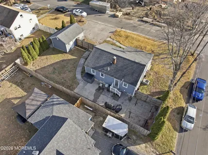 an aerial view of residential building with parking space