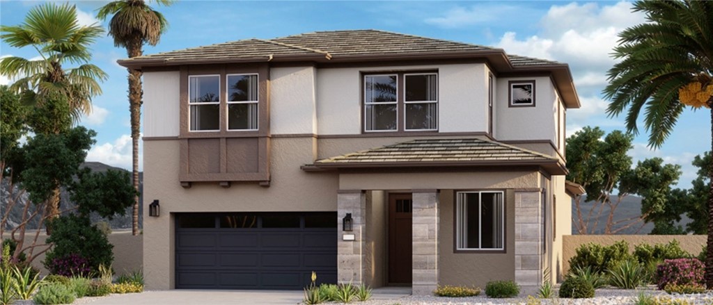 41150 Harvey Mudd Drive Palm Desert, CA 92211 - Photo 1 of 4 a front view of a house with a yard