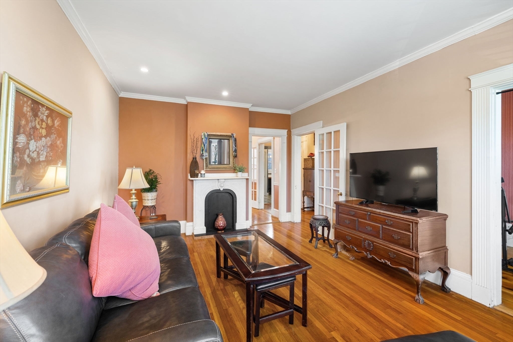 37 M Street Boston, MA 02127 - Photo 18 of 42 a living room with furniture and a flat screen tv