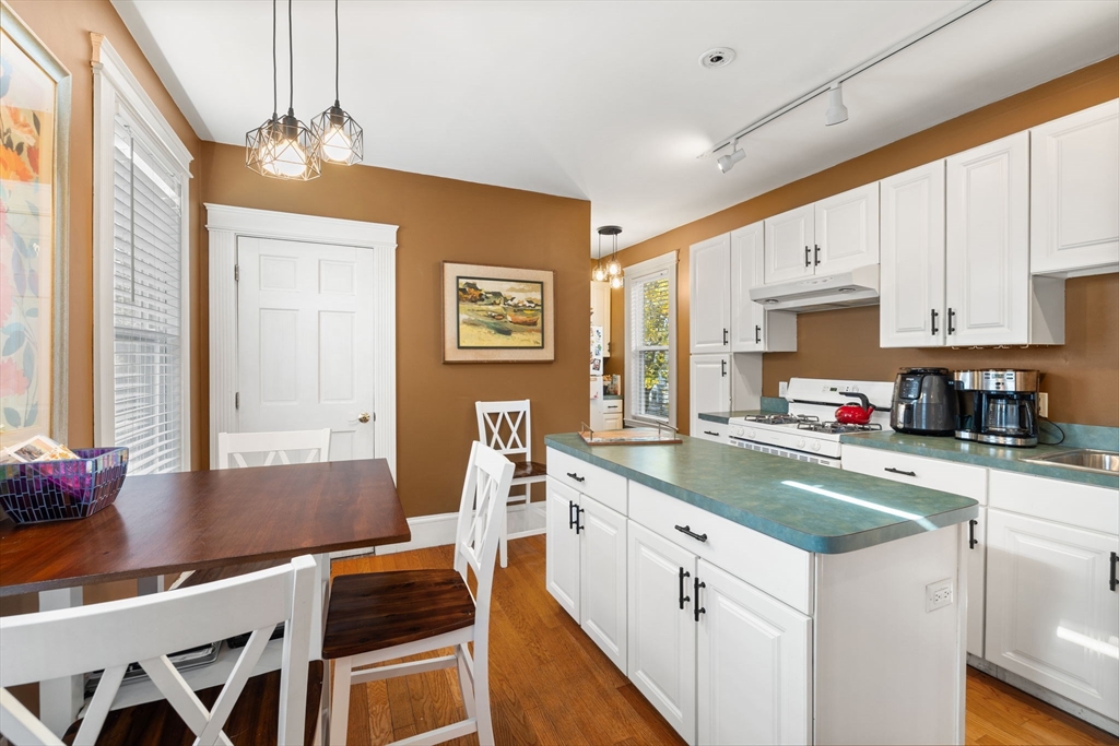 37 M Street Boston, MA 02127 - Photo 20 of 42 a kitchen with a sink cabinets and window