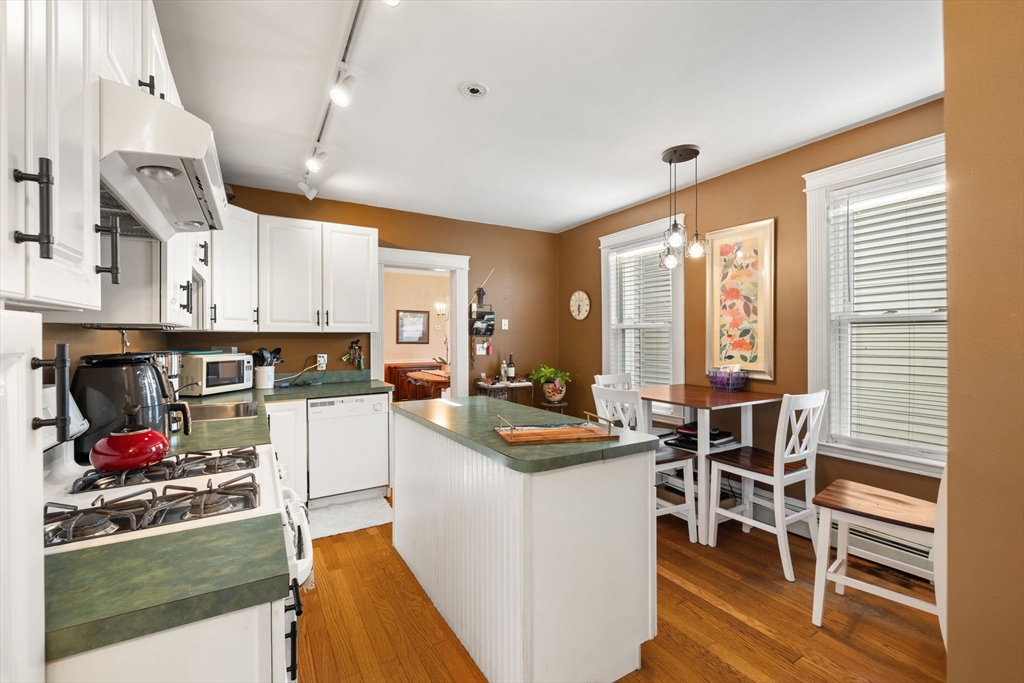 37 M Street Boston, MA 02127 - Photo 23 of 42 a kitchen that has a lot of appliances and cabinets