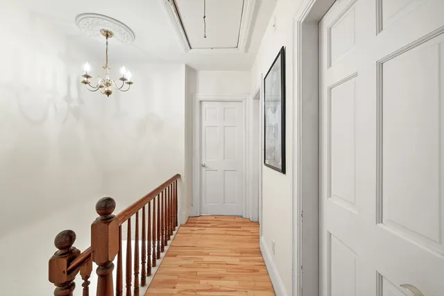 a view of a hallway with front door