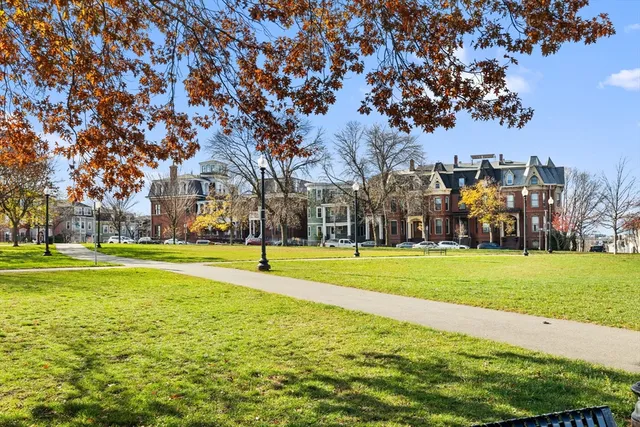 a building with trees in the background