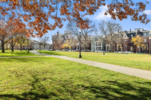 a building with trees in the background