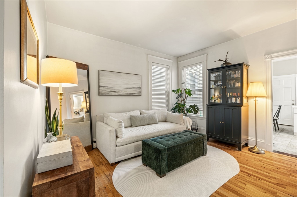 37 M Street Boston, MA 02127 - Photo 7 of 42 a living room with furniture and a lamp