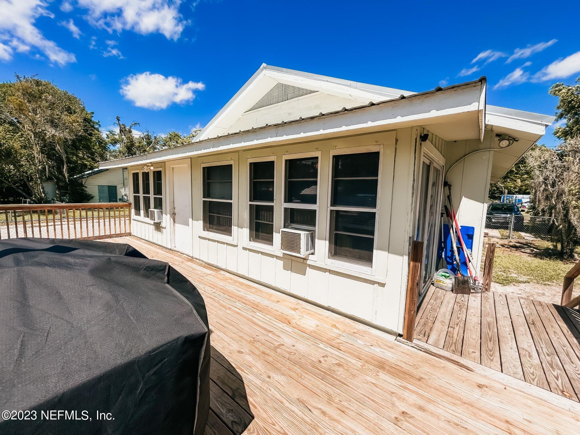 224 Benham Street Palatka, FL 32177 - Photo 13 of 15 a view of a house with a roof deck