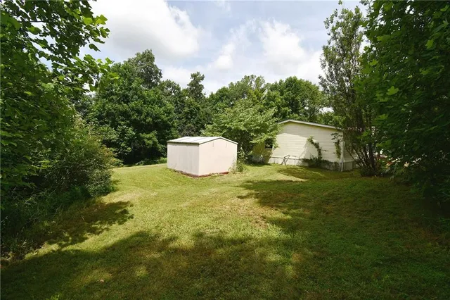 a house view with a garden space