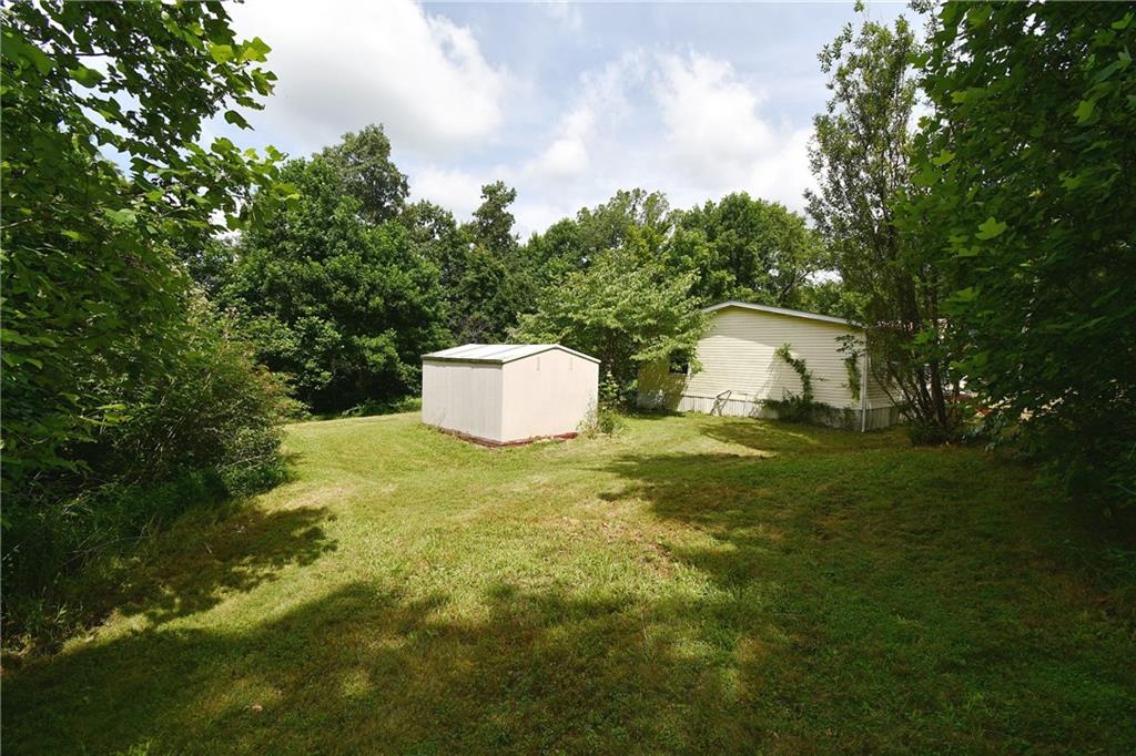45 Perkins Lane Burgettstown, PA 15021 - Photo 26 of 27 a house view with a garden space
