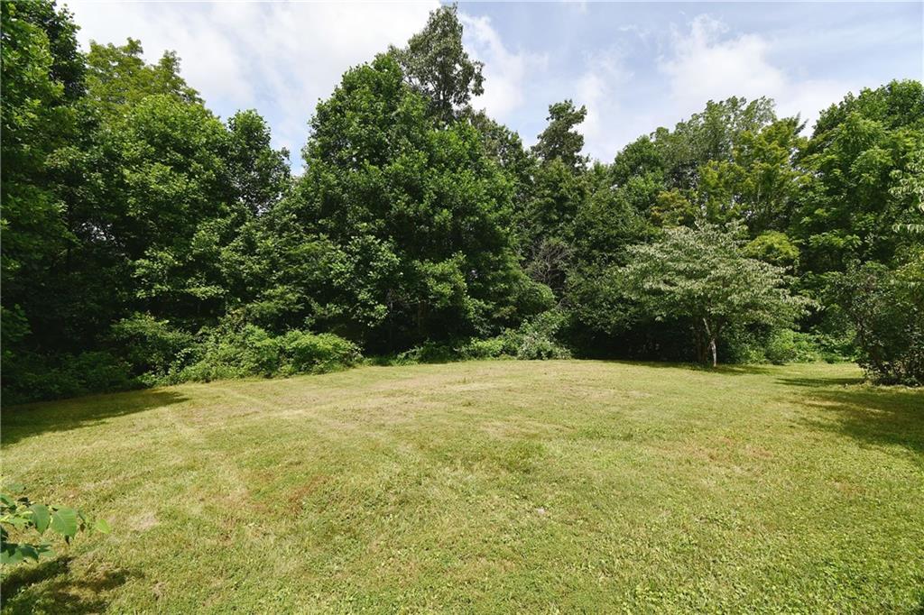 45 Perkins Lane Burgettstown, PA 15021 - Photo 8 of 27 a view of outdoor space with yard and trees around