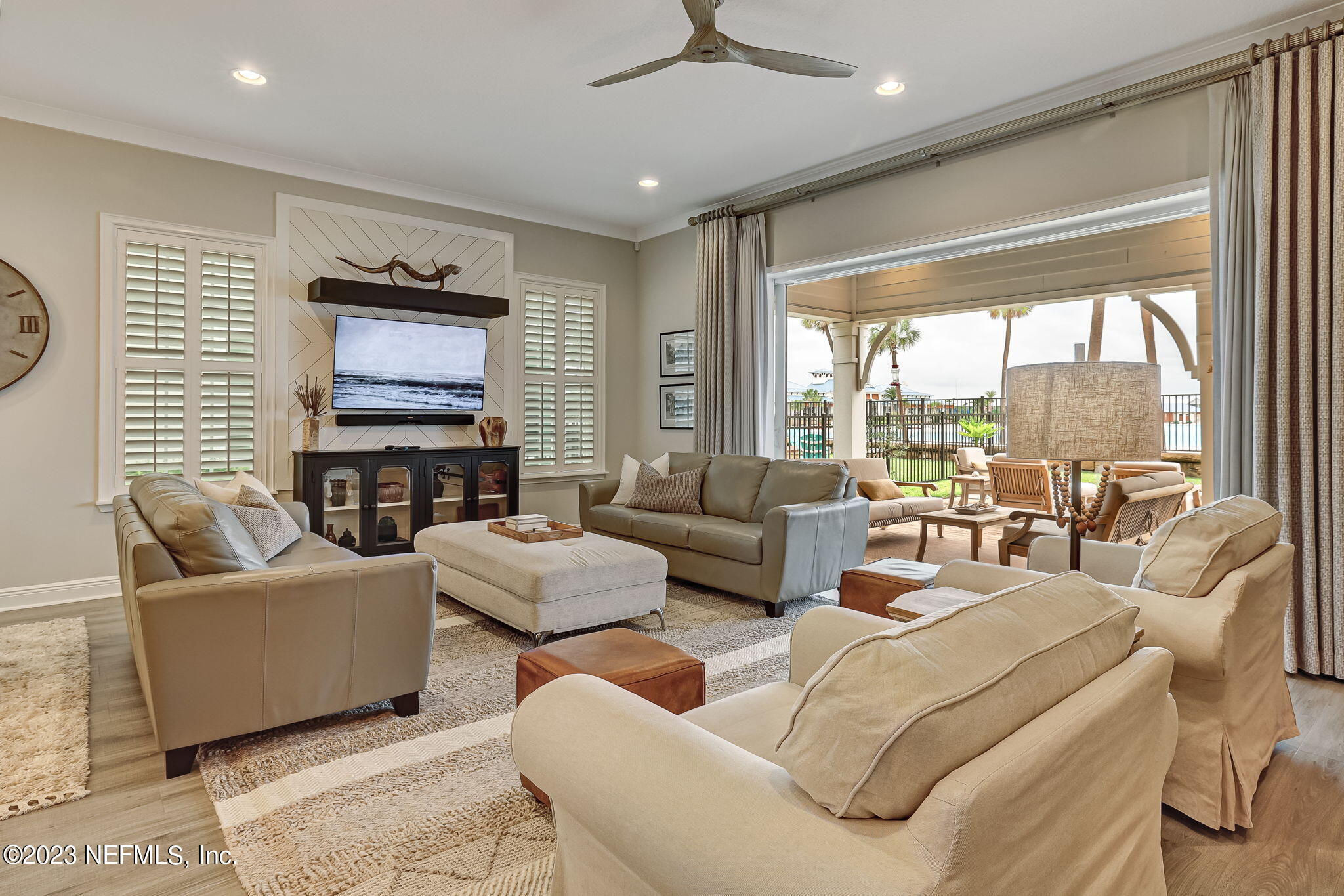 173 Rum Runner Way St. Johns, FL 32259 - Photo 14 of 104 a living room with fireplace furniture and a flat screen tv