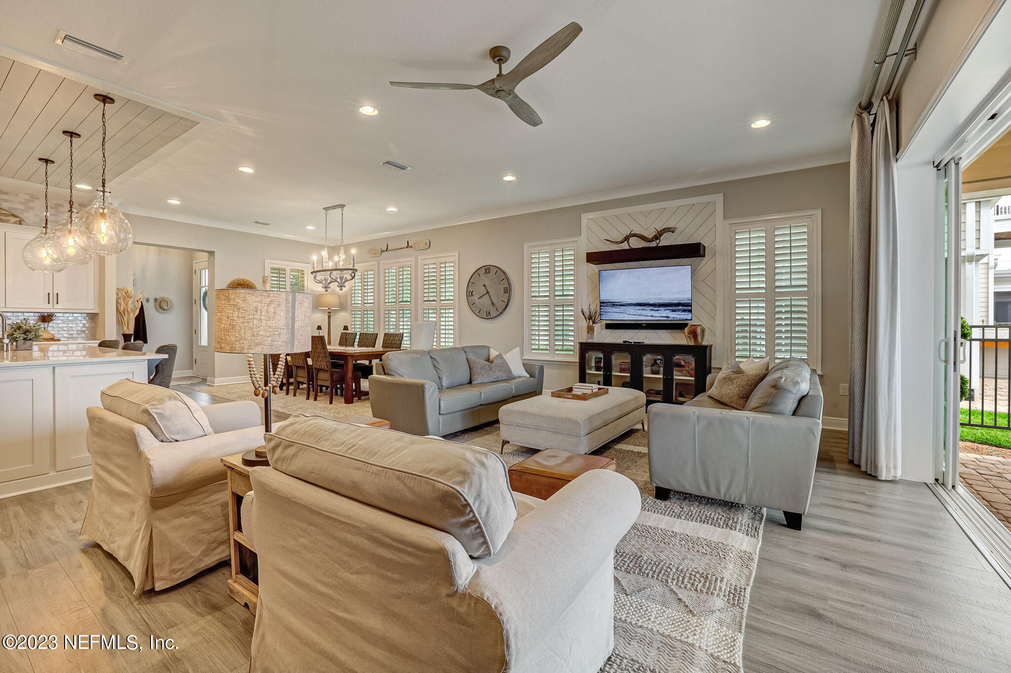 173 Rum Runner Way St. Johns, FL 32259 - Photo 15 of 104 a living room with furniture and a flat screen tv
