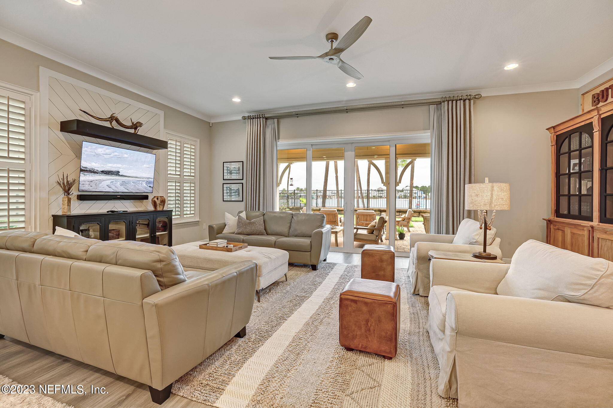 173 Rum Runner Way St. Johns, FL 32259 - Photo 16 of 104 a living room with furniture and a flat screen tv