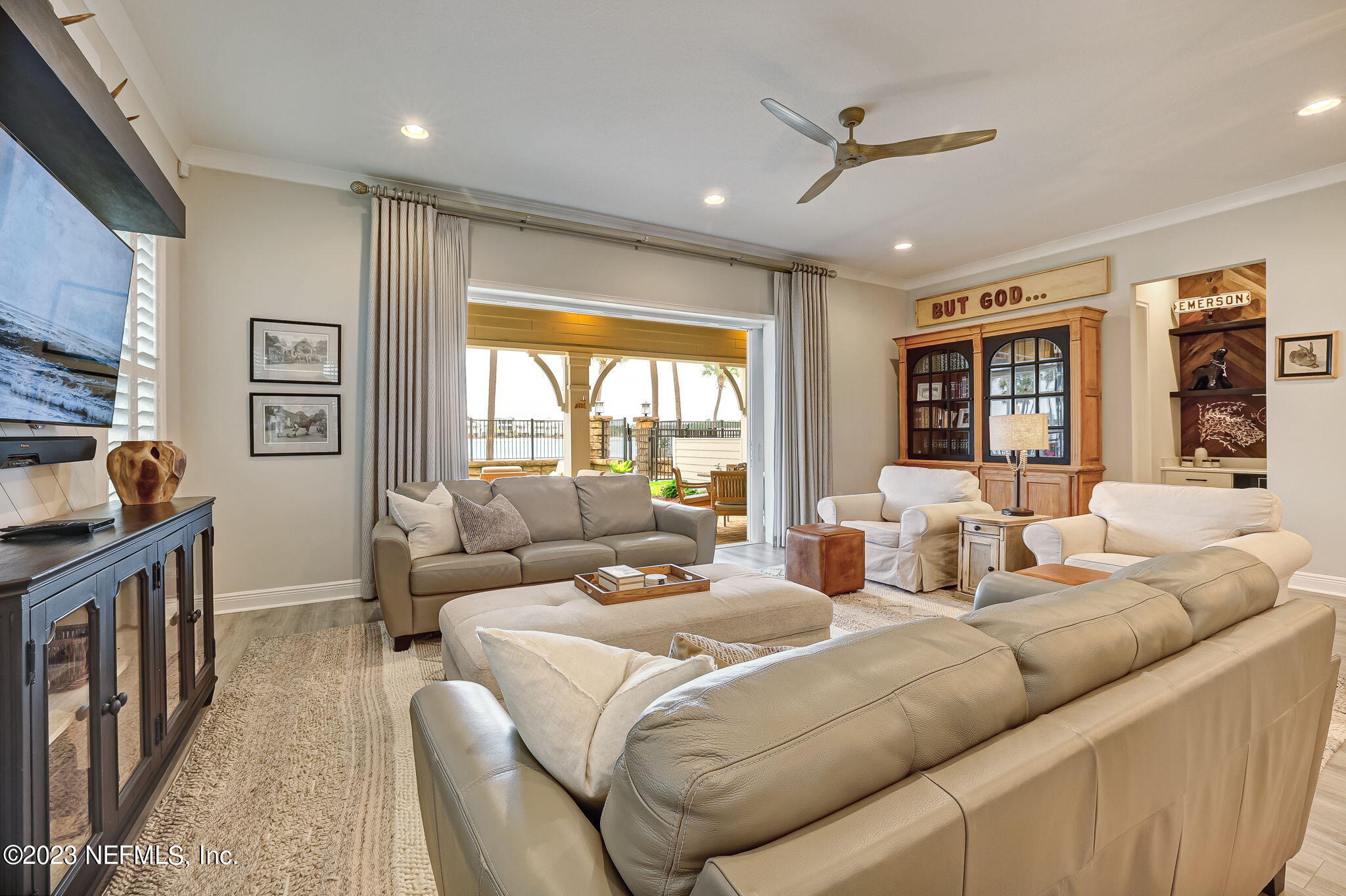 173 Rum Runner Way St. Johns, FL 32259 - Photo 17 of 104 a living room with furniture ceiling fan and a window