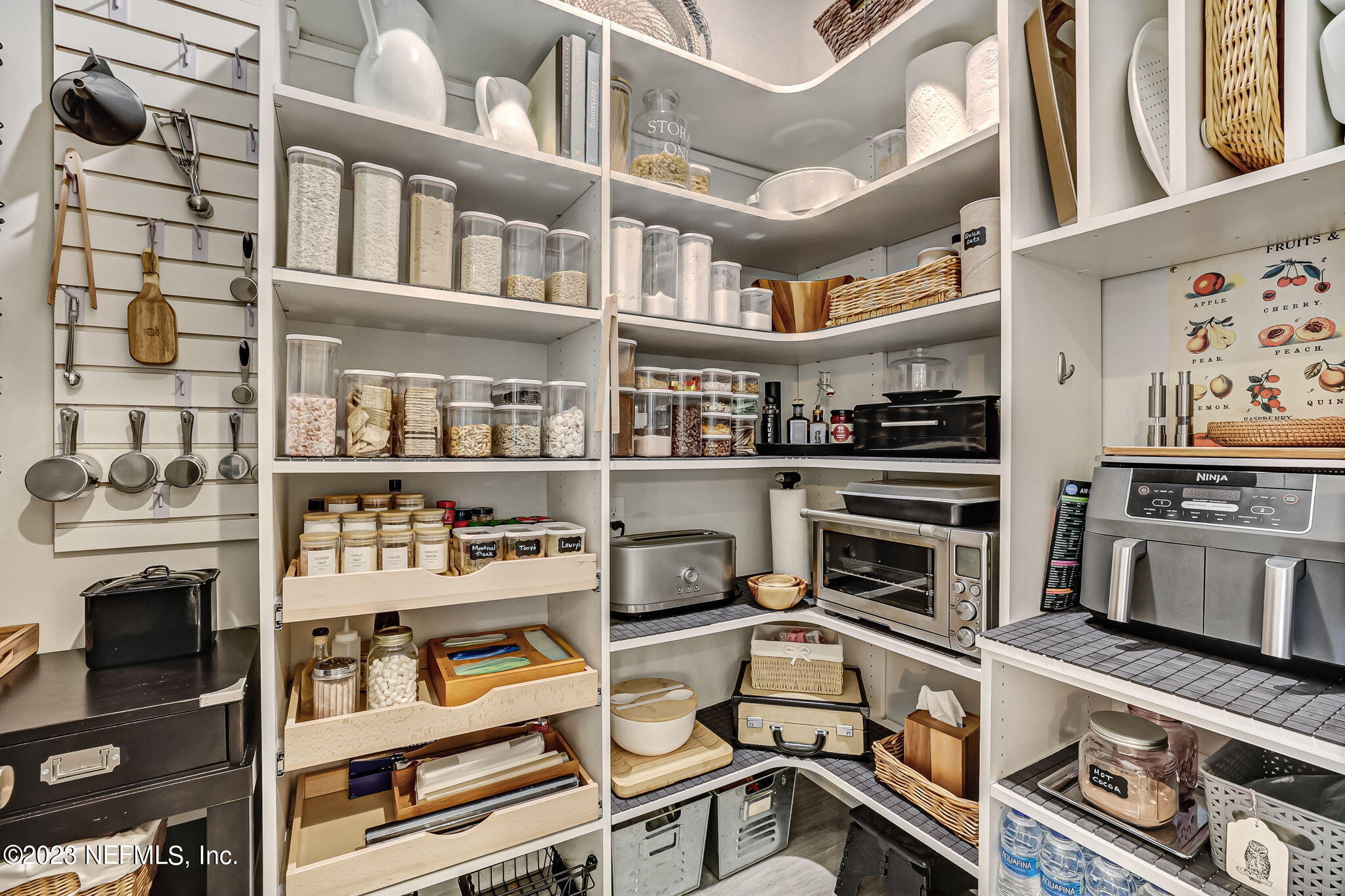 173 Rum Runner Way St. Johns, FL 32259 - Photo 30 of 104 a kitchen with stainless steel appliances a stove and a bookshelf