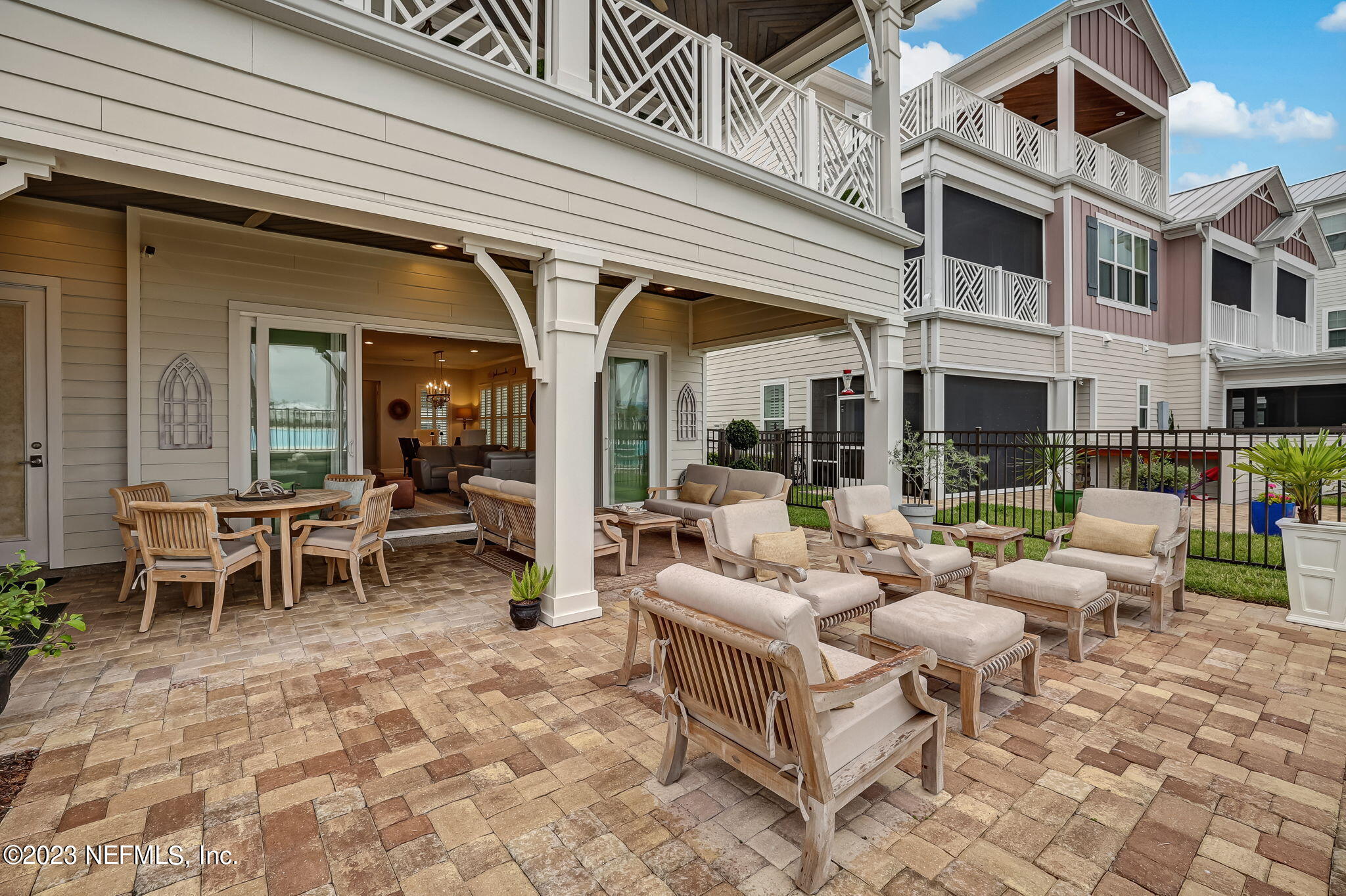 173 Rum Runner Way St. Johns, FL 32259 - Photo 36 of 104 a view of a patio with dining table and chairs