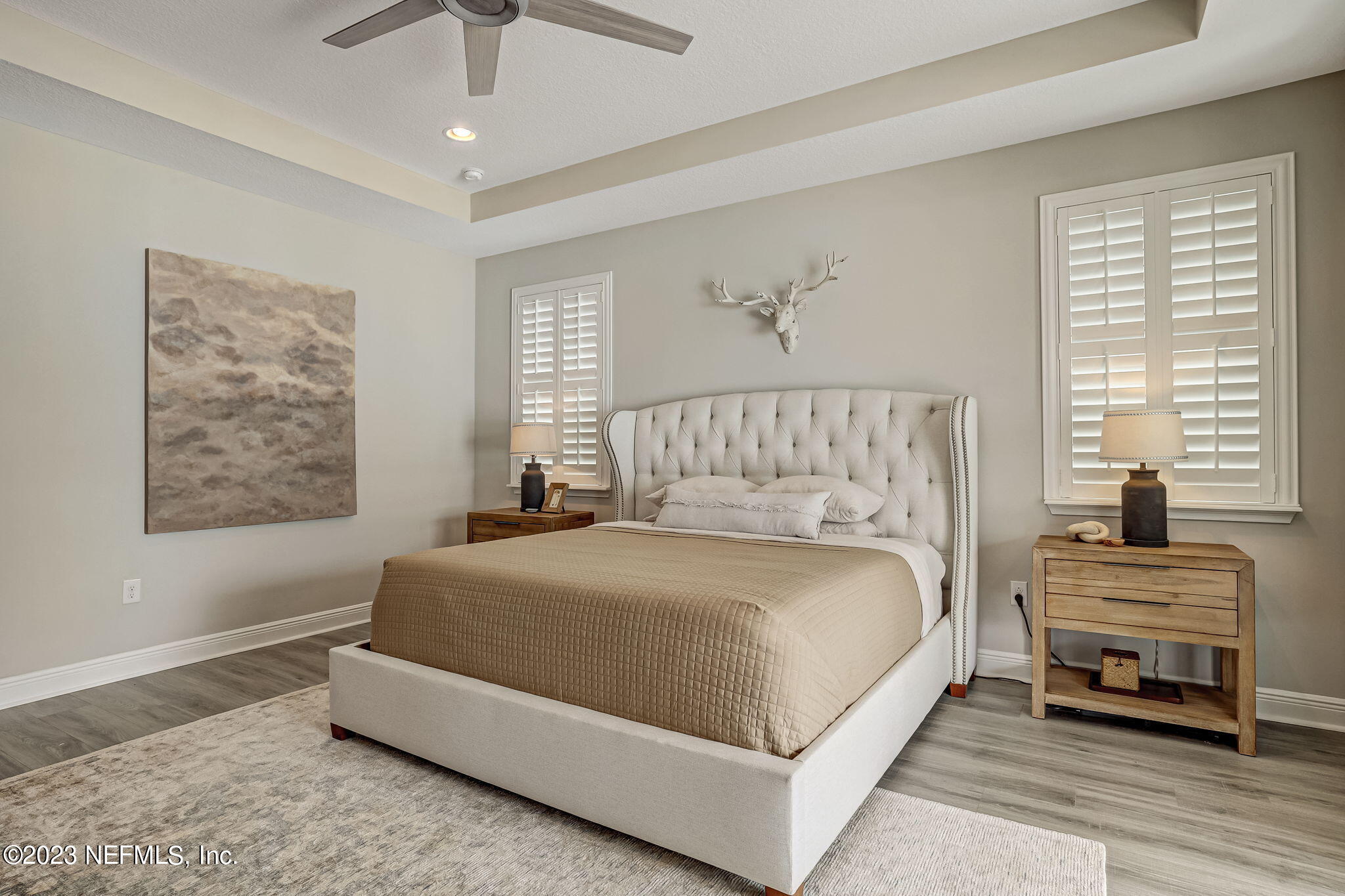 173 Rum Runner Way St. Johns, FL 32259 - Photo 40 of 104 a spacious bedroom with a bed and a window