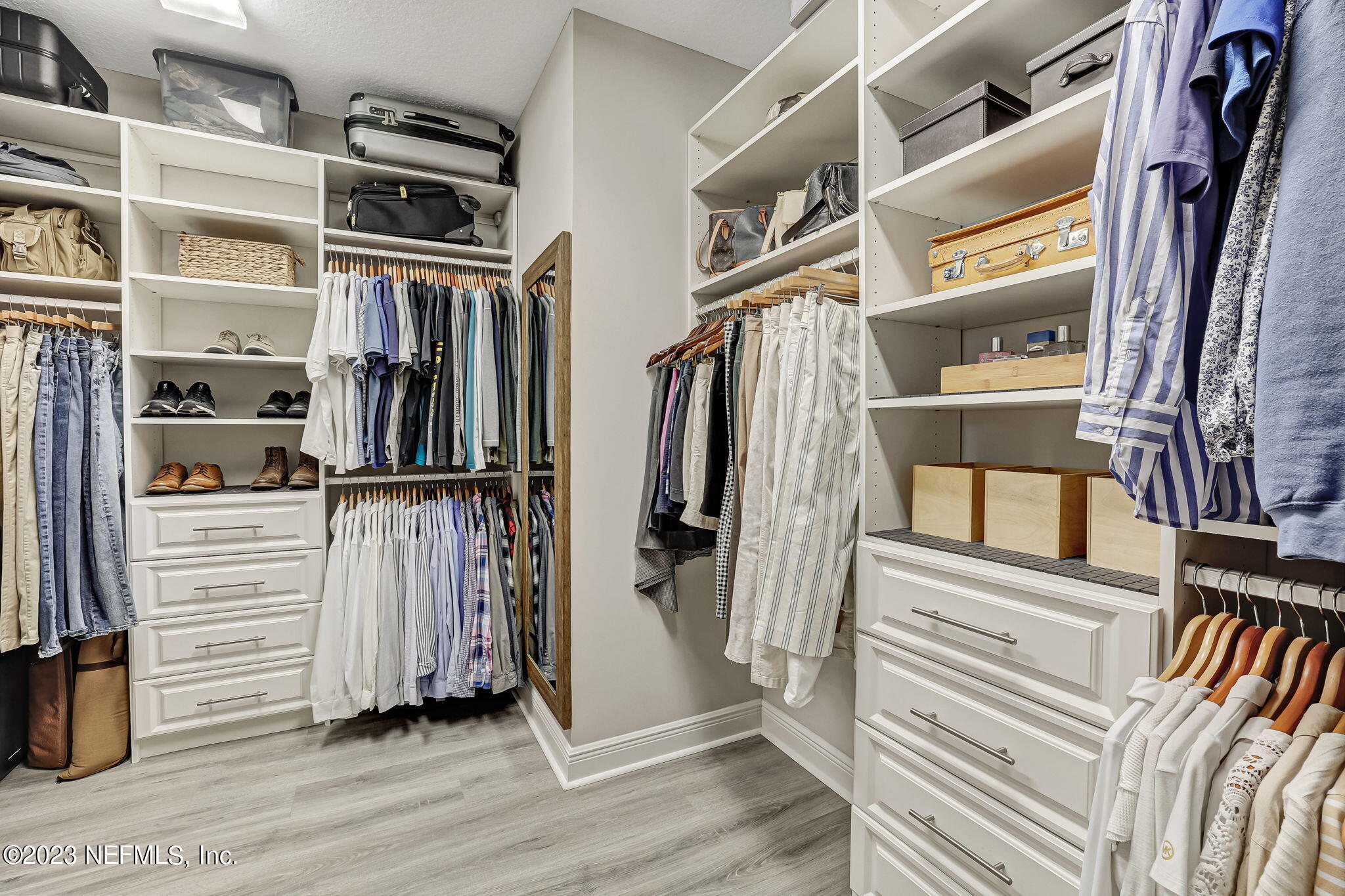 173 Rum Runner Way St. Johns, FL 32259 - Photo 43 of 104 a view of walk in closet with clothes and shoes