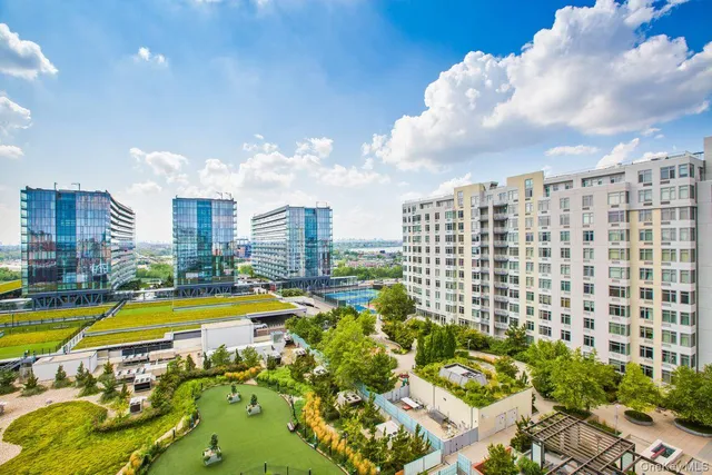 a view of a city with tall buildings