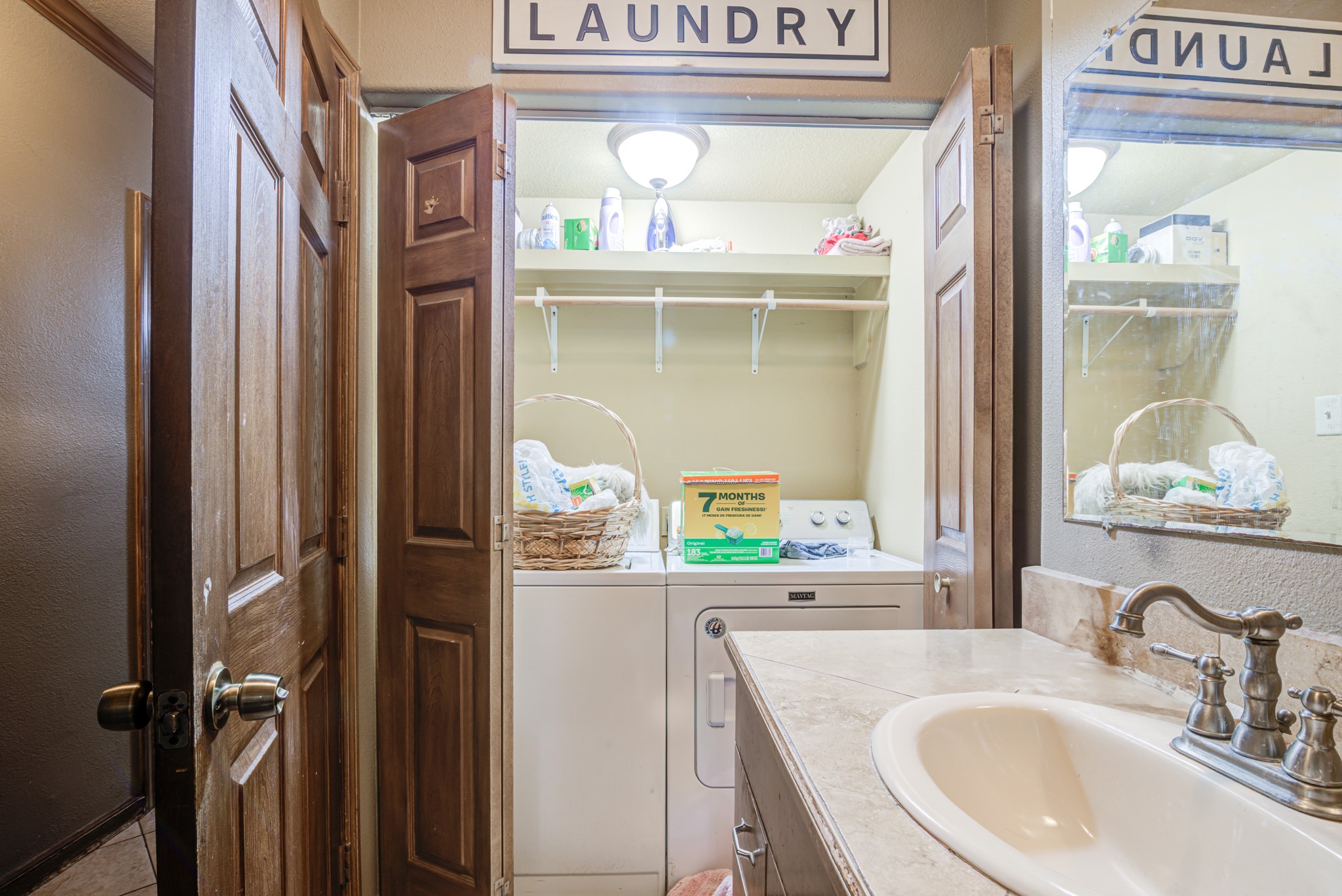8123 Tareyton Lane Houston, TX 77075 - Photo 12 of 27 a bathroom with a sink and a mirror