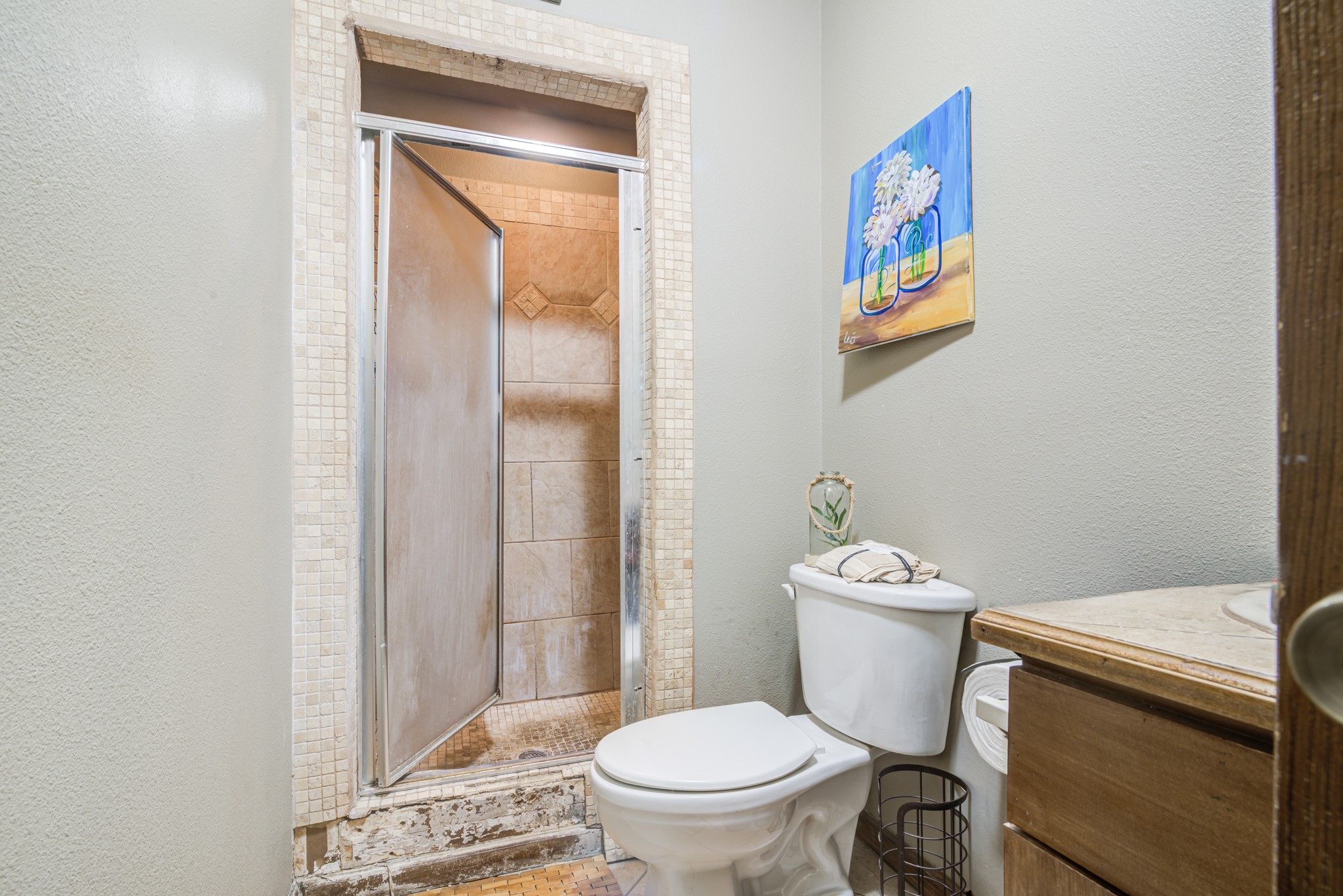 8123 Tareyton Lane Houston, TX 77075 - Photo 18 of 27 a white toilet sitting next to a bathroom sink