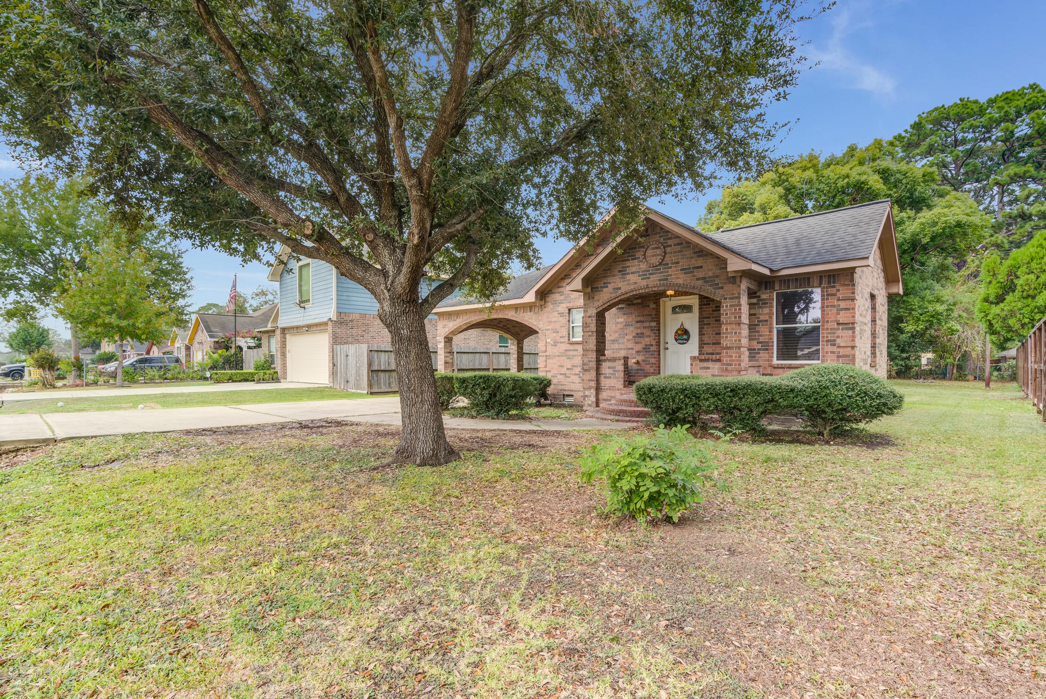 8123 Tareyton Lane Houston, TX 77075 - Photo 3 of 27 a front view of a house with garden