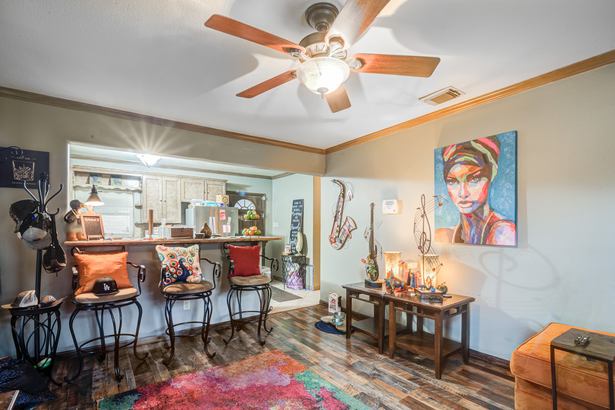 8123 Tareyton Lane Houston, TX 77075 - Photo 6 of 27 a living room with lots of furniture and paintings on the wall