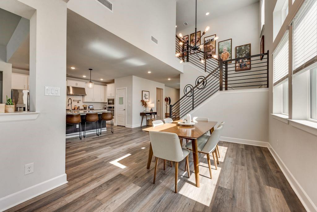 2417 Robin Way Northlake, TX 76247 - Photo 1 of 1 a view of a dining room with furniture and wooden floor
