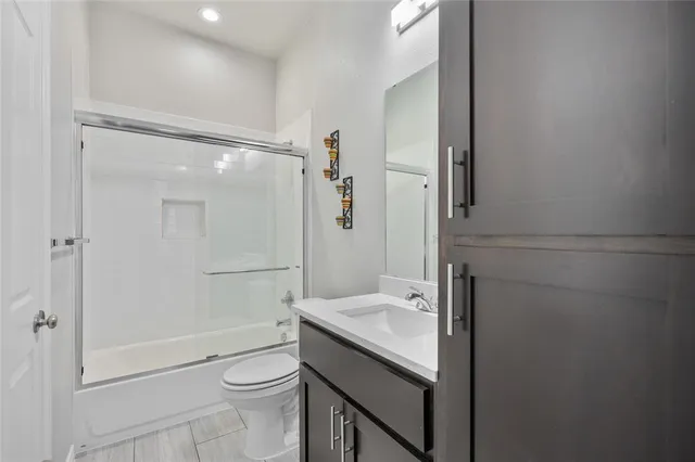 a view of a livingroom with furniture and wooden floor