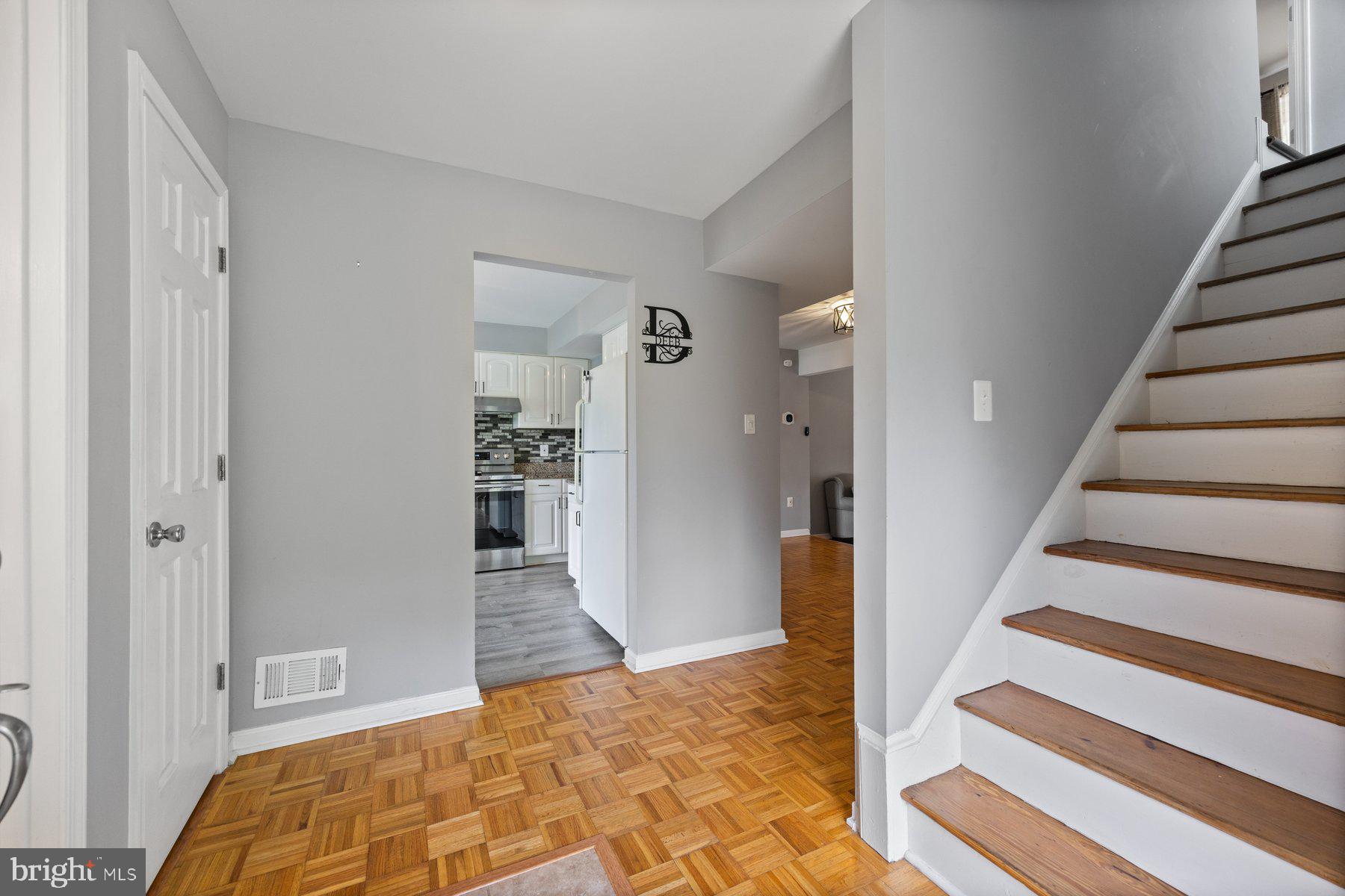 Foyer with Parquet Flooring