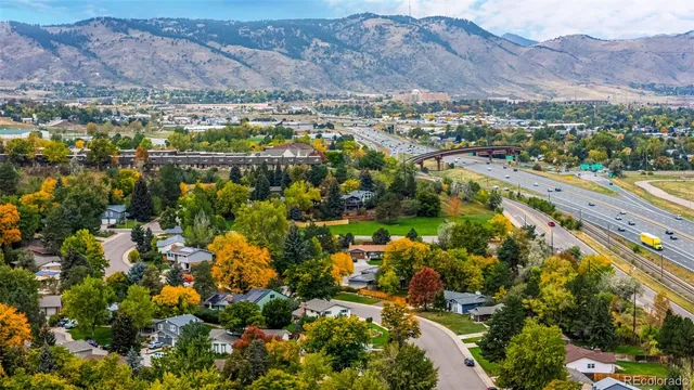 a view of a city with mountains in the background
