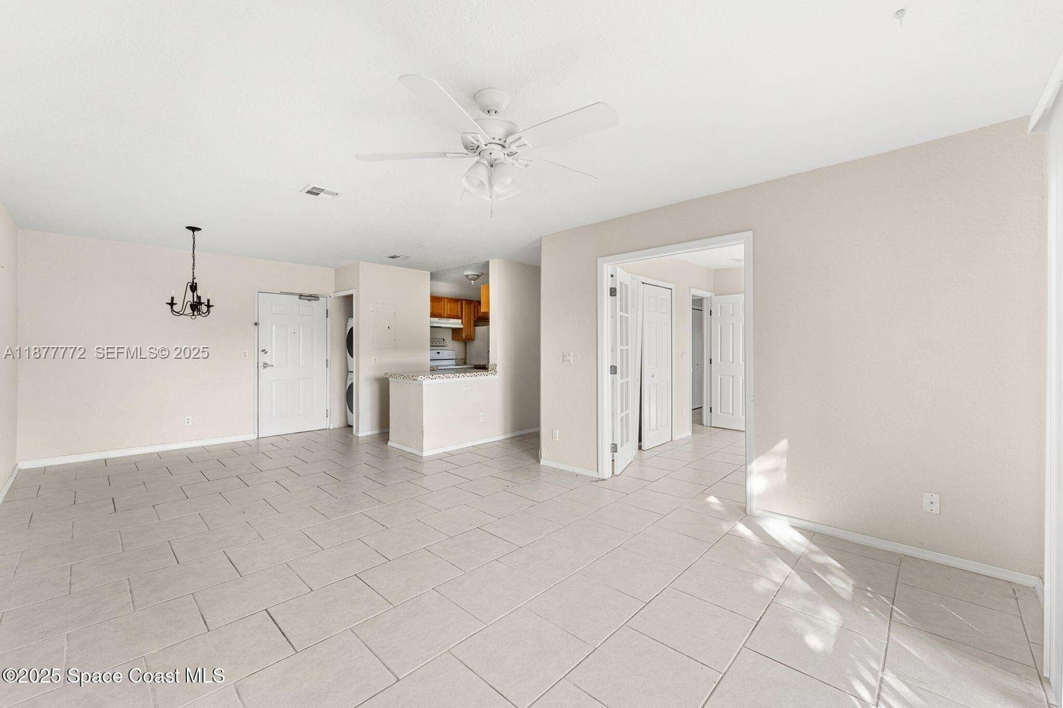 220 Columbia Drive, Unit 31 Cape Canaveral, FL 32920 - Photo 21 of 23 a view of a livingroom with kitchen and furniture