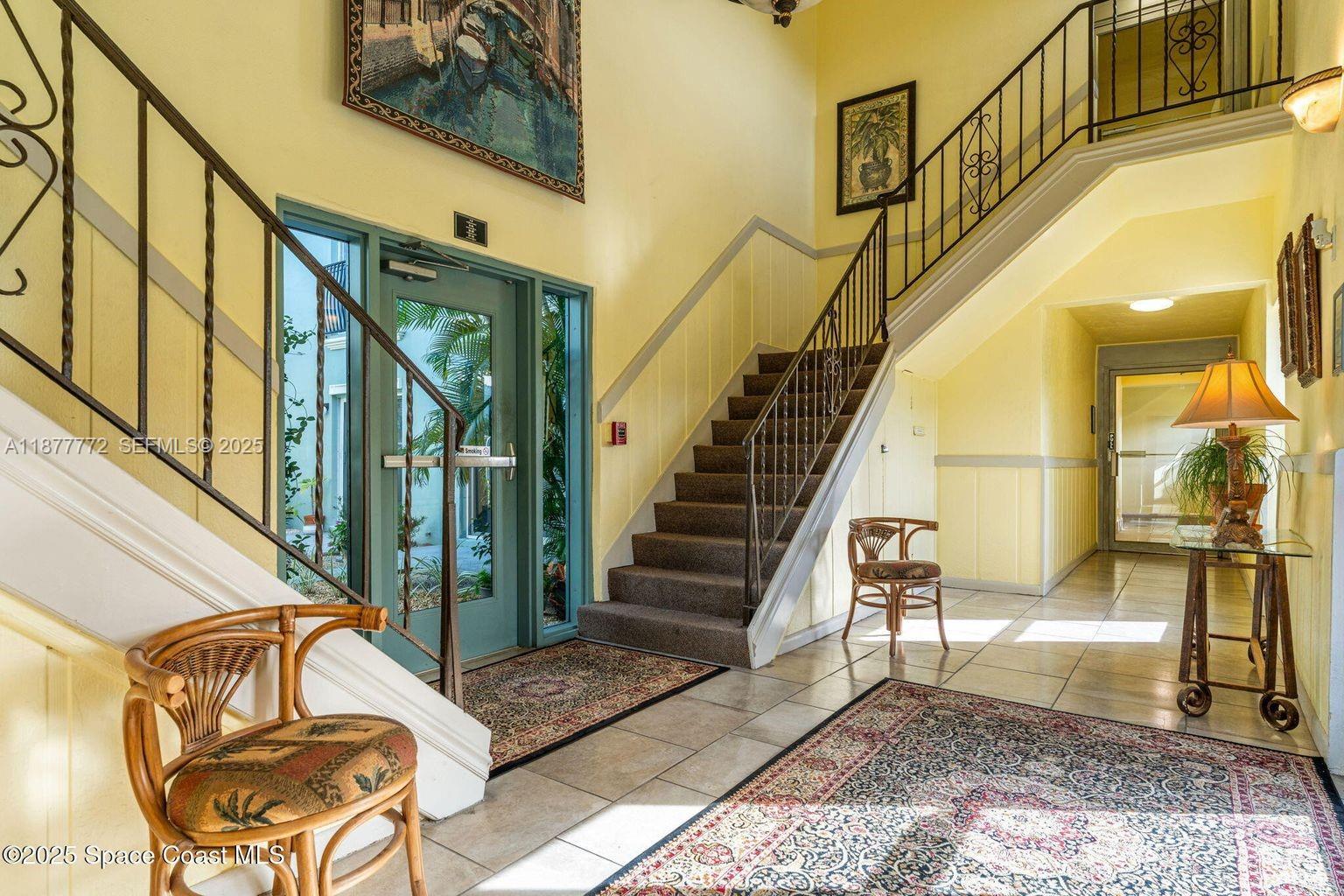 220 Columbia Drive, Unit 31 Cape Canaveral, FL 32920 - Photo 22 of 23 a view of entryway and hall with wooden floor
